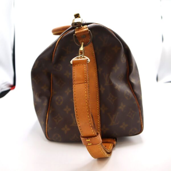 Sida av Louis Vuitton Keepall 48 Bandouliere