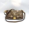 Framsida av Louis Vuitton Bicolor Empreinte Leather